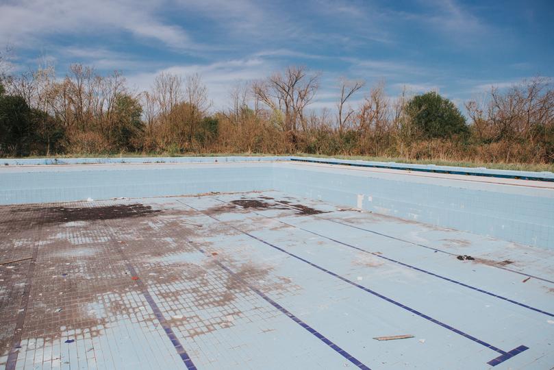 Pool being removed from a backyard